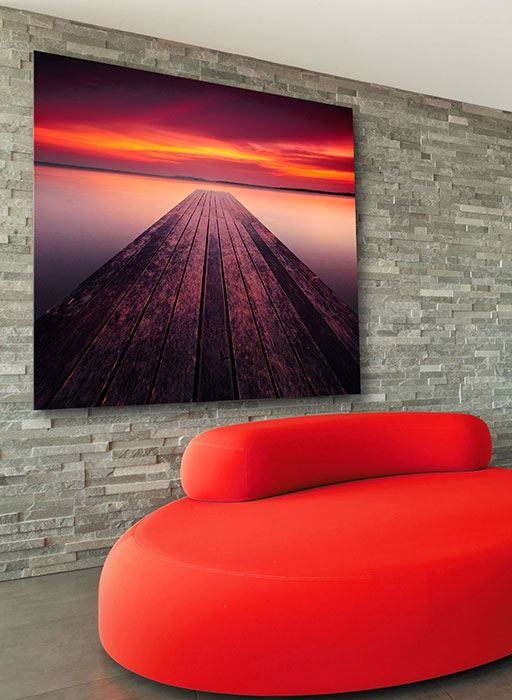 Med den rigtige opklæbning kan store plakater også hænges op uden ramme.